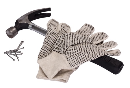 Pair of work glove with claw hammer and nailsの写真素材