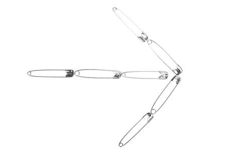 Arrow shape made of safety pins