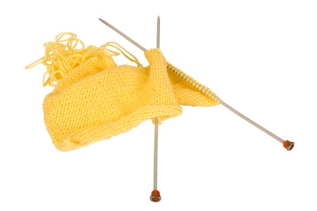 Close-up of woolen yarn with knitting needlesの写真素材