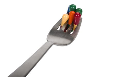 Close-up of capsules on a forkの写真素材