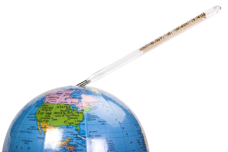 Close-up of a globe with a thermometerの写真素材