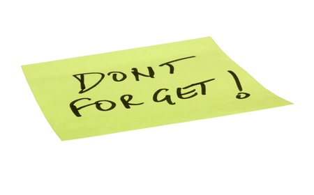 Don't Forget text written on an adhesive noteの写真素材