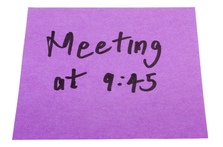 Word Meeting written on an adhesive note