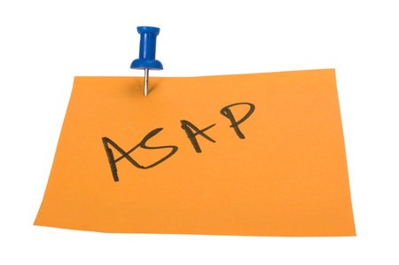 Word ASAP written on an adhesive noteの写真素材