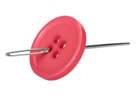 Close-up of a needle in the button holeの写真素材