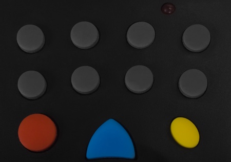 Close-up of buttons of a remote controlの写真素材