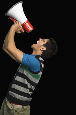 Man shouting into a megaphoneの写真素材