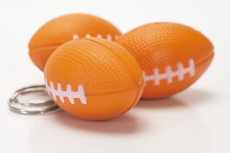 Close-up of American football shaped key ringsの写真素材
