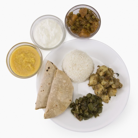 High angle view of assorted Indian food