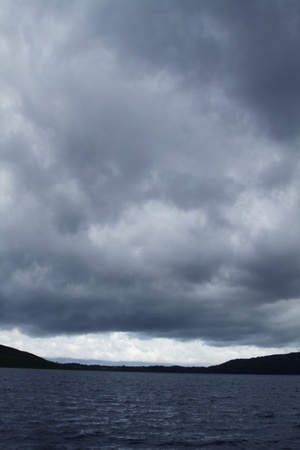 Clouds over a lake, Lakes of Killarney, County Kerry, Republic of Irelandの写真素材