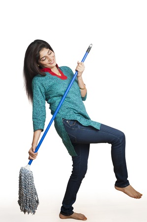Woman cleaning floor with a mopの写真素材