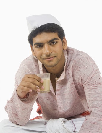 Portrait of a man drinking teaの写真素材