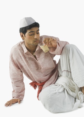 Man drinking teaの写真素材