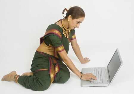 Woman using a laptopの写真素材