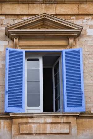 Low angle view of a window of a building, Alberobello, Bari, Puglia, Italyの写真素材