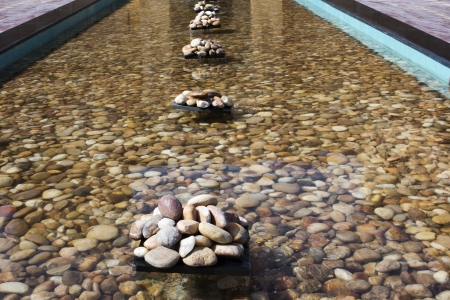 Pebbles in an artificial pond, Jaisalmer, Rajasthan, Indiaの写真素材