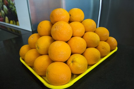 Close-up of oranges on a table, Chennai, Tamil Nadu, Indiaの写真素材