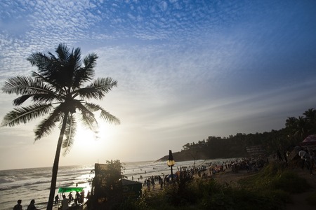 Tourists on the beach, Kovalam, Kerala, Indiaのeditorial素材
