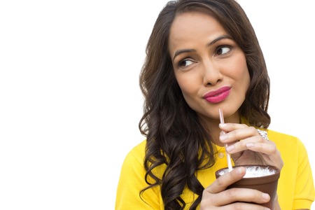 Close-up of a woman drinking milkの写真素材