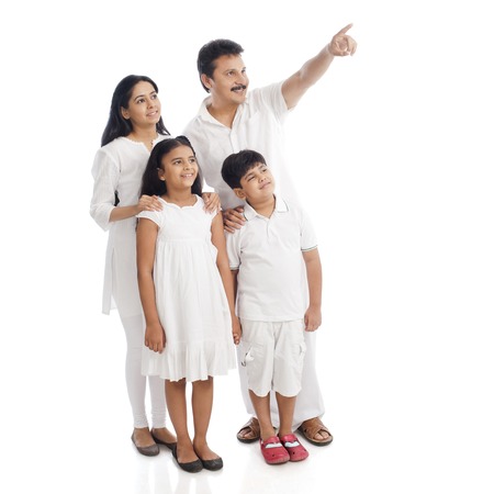 Parents standing with their childrenの写真素材