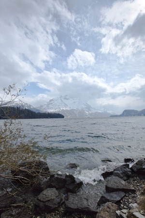 Lake with mountains  in a valley, St. Moritz, Italyの写真素材