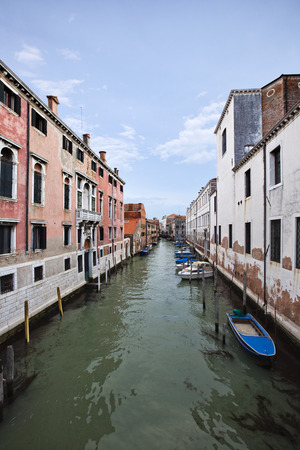 Buildings along a canal, Venice, Veneto, Italyの写真素材