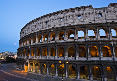 Road passing near an amphitheater, Coliseum, Lazio, Rome, Rome Province, Italyの写真素材