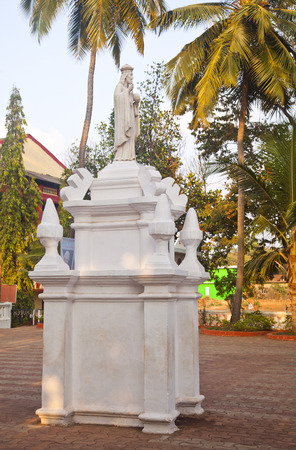 Statue outside a church, Goa, Indiaの写真素材