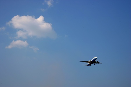 Airplane flying in the skyのeditorial素材