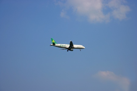Airplane flying in the skyのeditorial素材