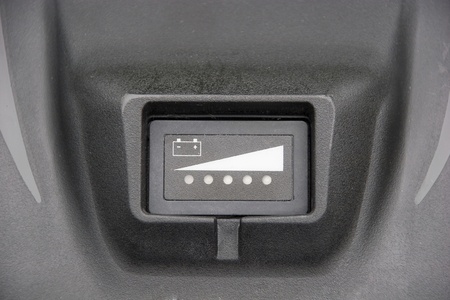Charge indicator on a cordless electric lawnmower の写真素材