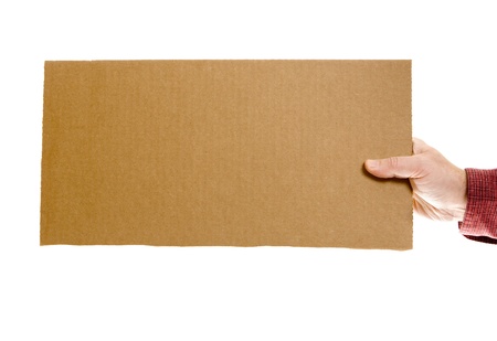 Casual dressed man`s hand holding a blank cardboard sign  の写真素材