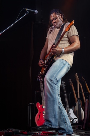 Rock guitarist performing on stage の写真素材