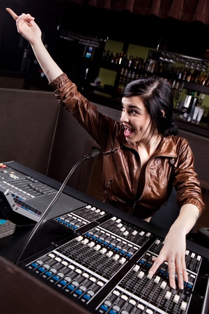 Soundboard technician doing a sound check の写真素材