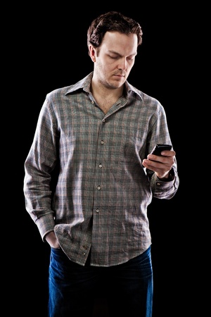 Man texting on smartphone の写真素材