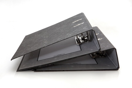 Close-up of binders on white background