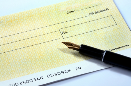 Blank check and penの写真素材