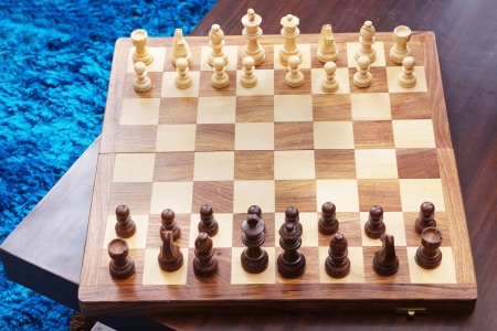 Chess battle on wood board
