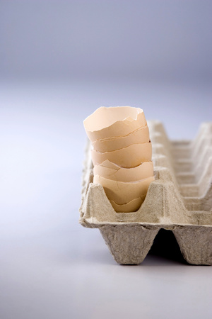 A stack of egg shells on the egg tray