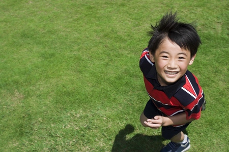 Boy running in the park