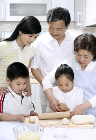 Family baking in the kitchenの写真素材