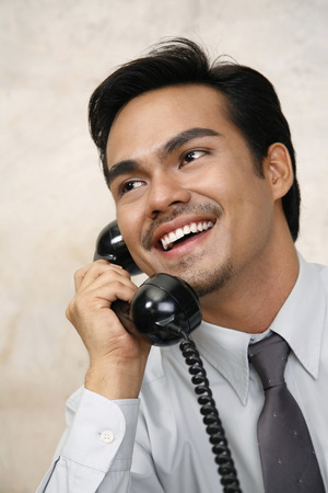 Businessman talking on the phoneの写真素材