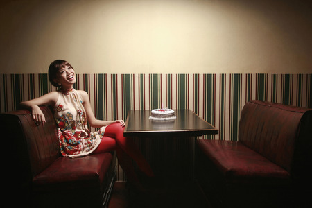 Woman smiling on her birthdayの写真素材
