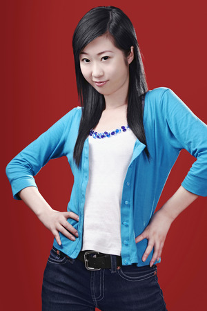 Woman striking a pose for the cameraの写真素材