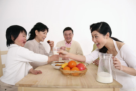 Family having breakfast togetherの写真素材