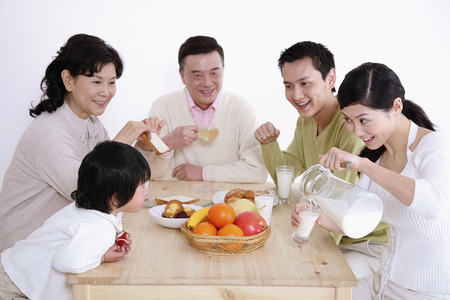 Family having breakfast togetherの写真素材