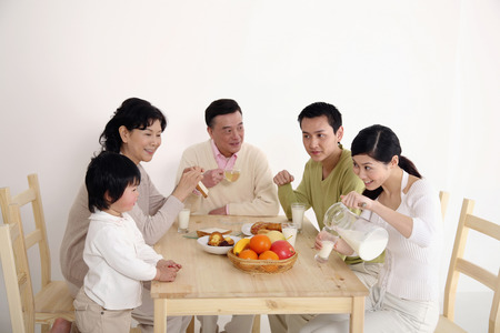 Family having breakfast togetherの写真素材