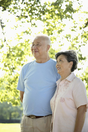 Senior man and woman in the parkの写真素材