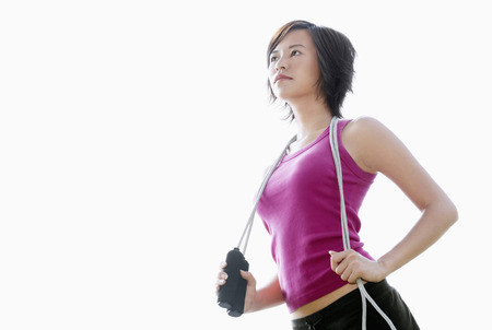 Woman with jumping ropeの写真素材