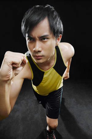 Man in running poseの写真素材